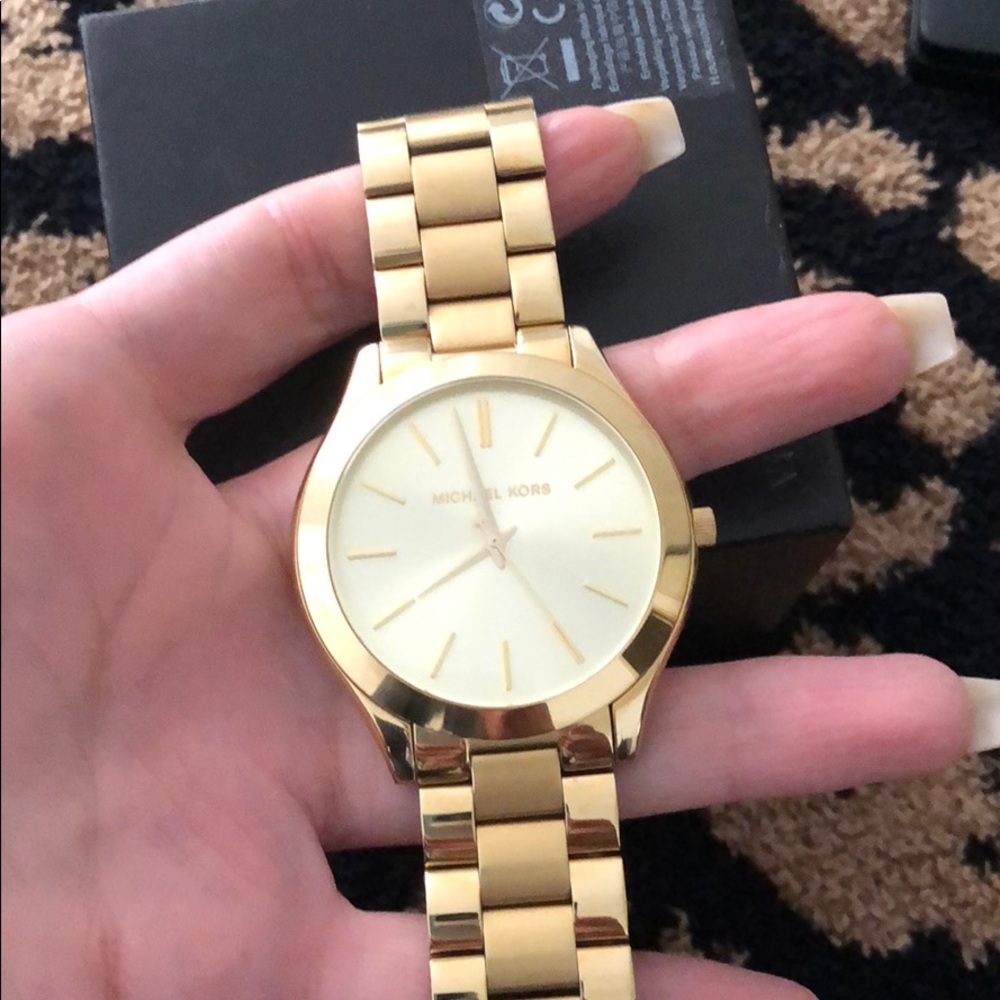 Women gold Michael Korda watch